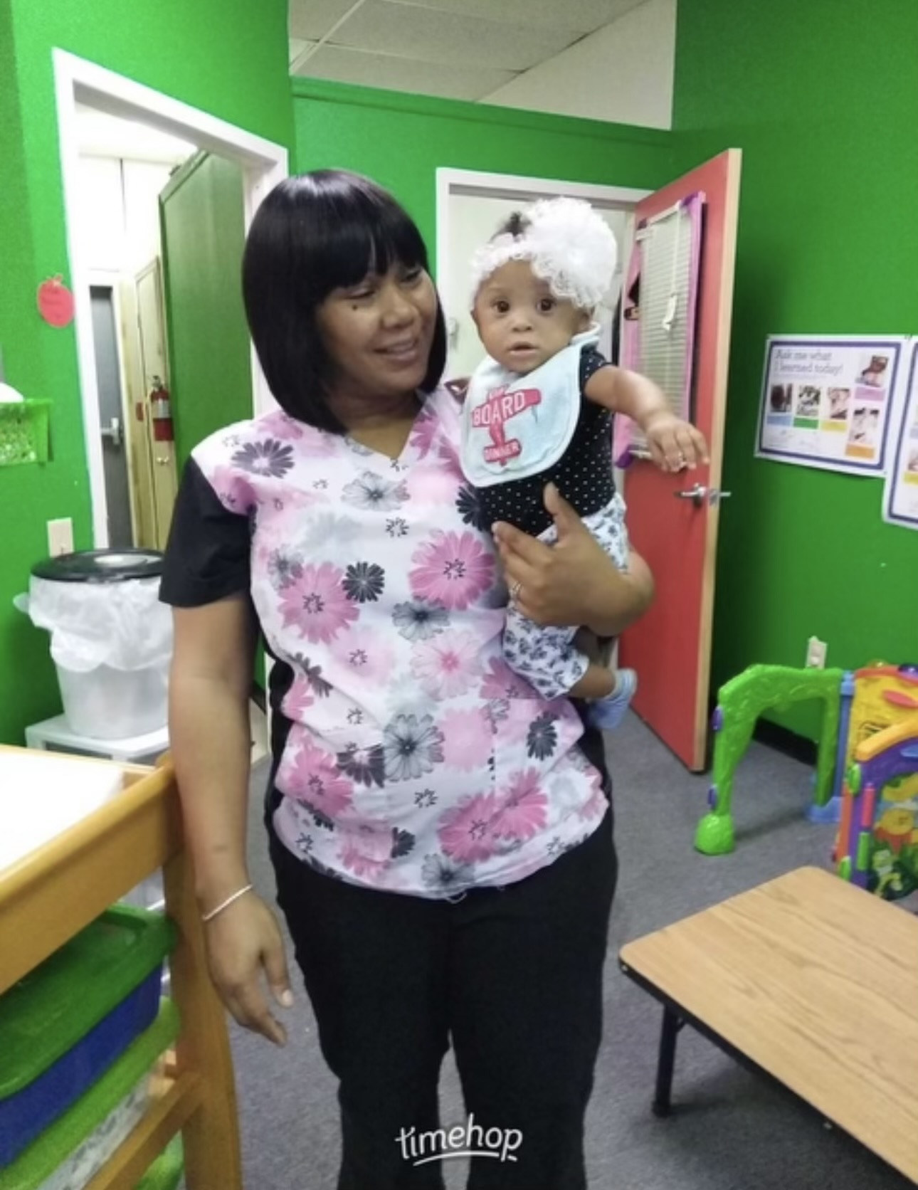 Laura Green holding an infant at LearningTree